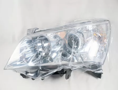 Headlight left Sedan with white background